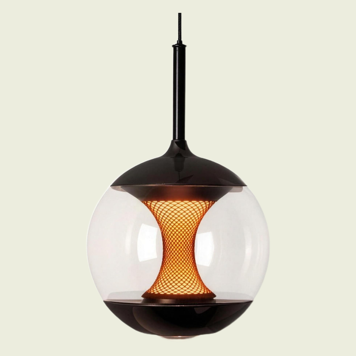 Clear glass globe pendant with amber glow core on a cream background