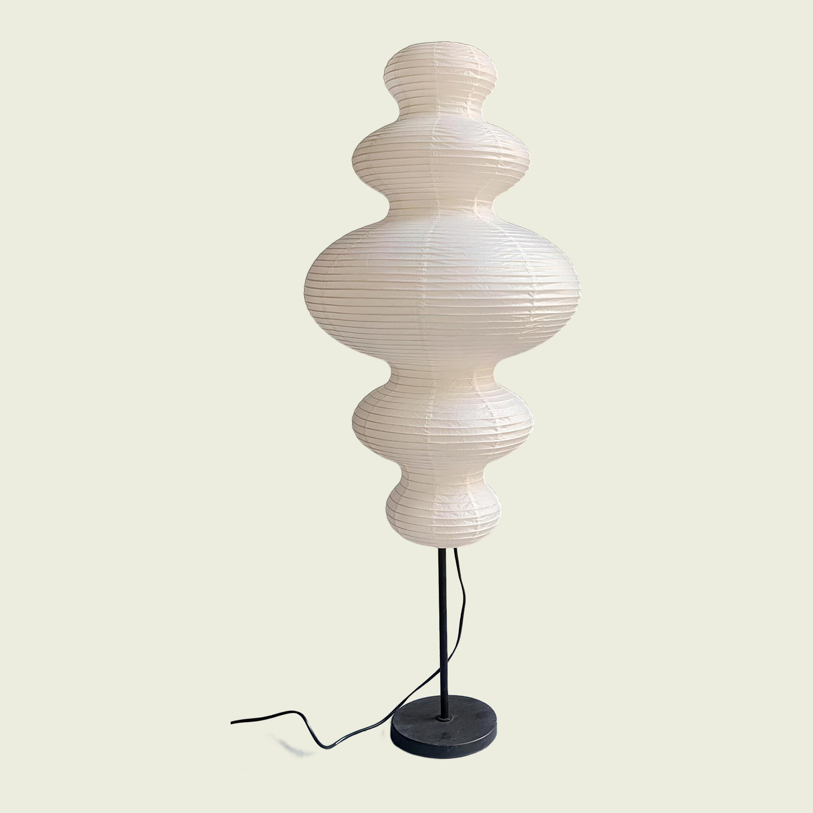 Stacked paper gourd floor lamp, white ribbed shade on slim black stand