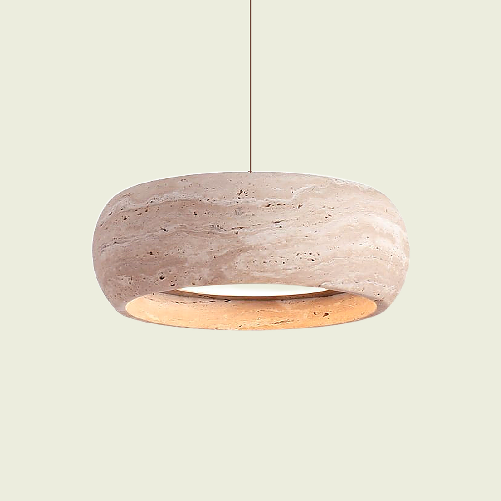 Rounded barrel travertine drum pendant light with glowing open ring, front view