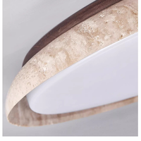 Travertine wabi-sabi ceiling light, close-up of the ground and polished travertine rim, wood base and acrylic diffuser