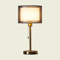 Double Shade Bedside Lamp, brass stem, white inner shade, lit