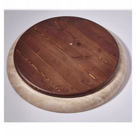 Travertine wabi-sabi ceiling light, the solid wood base and travertine rim seen from the back