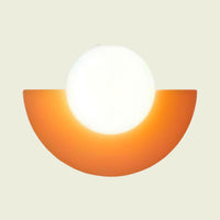 Orange iron half moon wall sconce with opal glass globe, front view