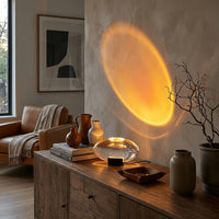 Warm sunset-toned light projection in a cozy living room