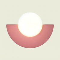 Pink iron half moon wall sconce with opal glass globe, front view