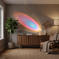 Colourful oval light projection above a console table