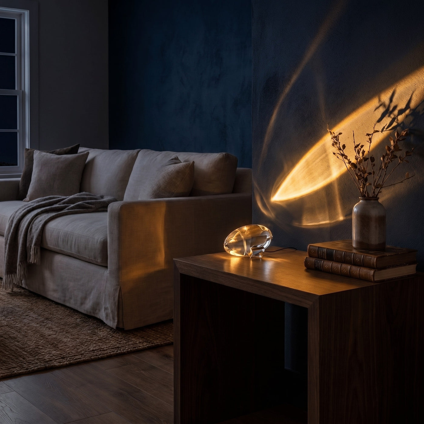 Projection lamp glowing at night as the room's main light source