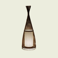 Woven cone floor lamp, black bamboo, on a cream background