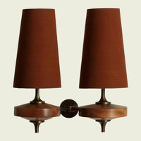 Red fabric double cone wall sconce, twin walnut mounts — 14" (35.5 cm) wide